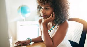 woman on computer telehealth